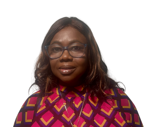 Udoka Ume in printed blouse smiling