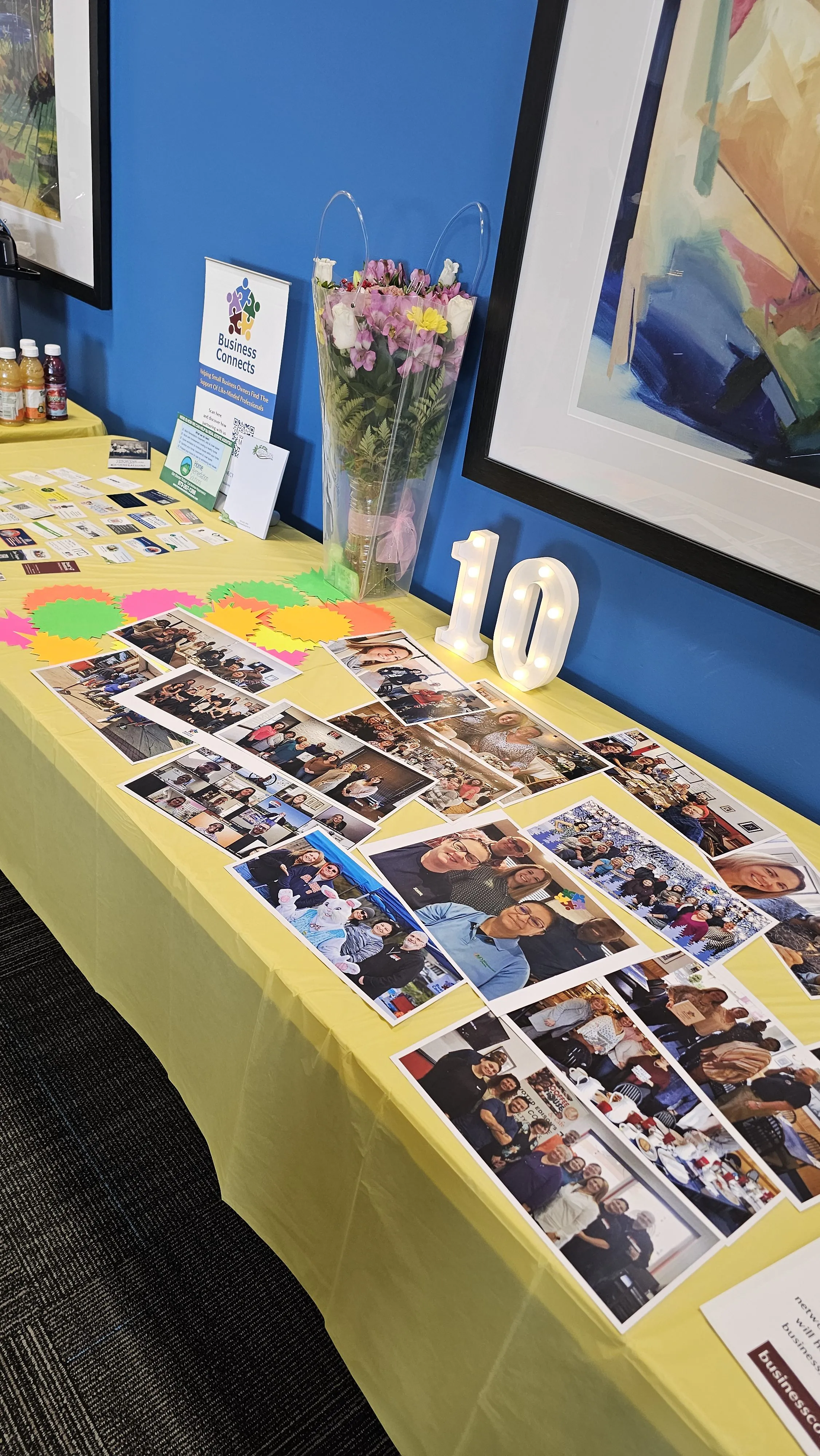Memory table with photos and keepsakes at the Business Connects NJ 10th anniversary celebration